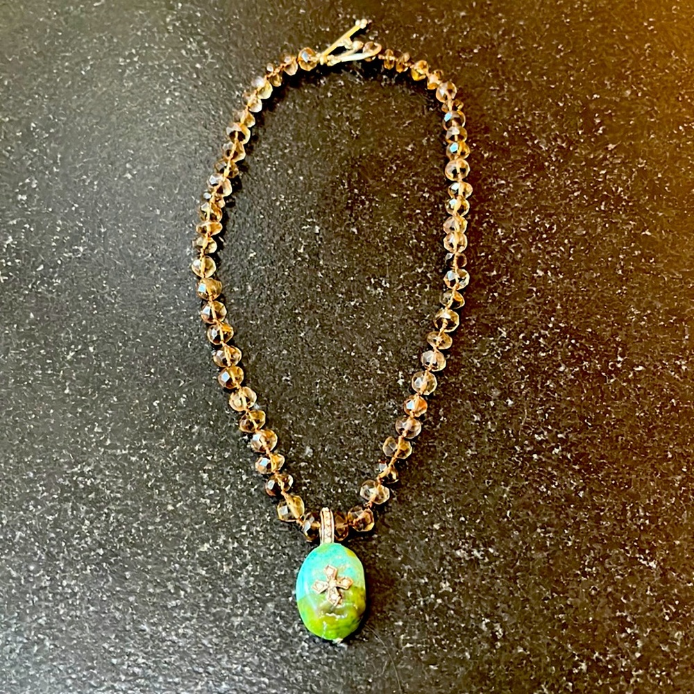 Genuine Smokey quartz and turquoise pendant with diamond accents on pendant.